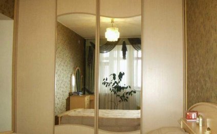 The Cabinet Is Brown In The Bedroom